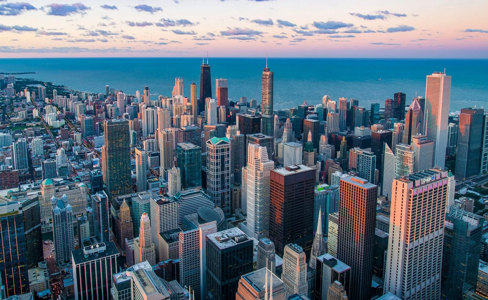 Can You Name the 50 Largest U.S. Cities? Take This Mega City Quiz And See How Many You Get Right! 1 City skyline at sunset over water