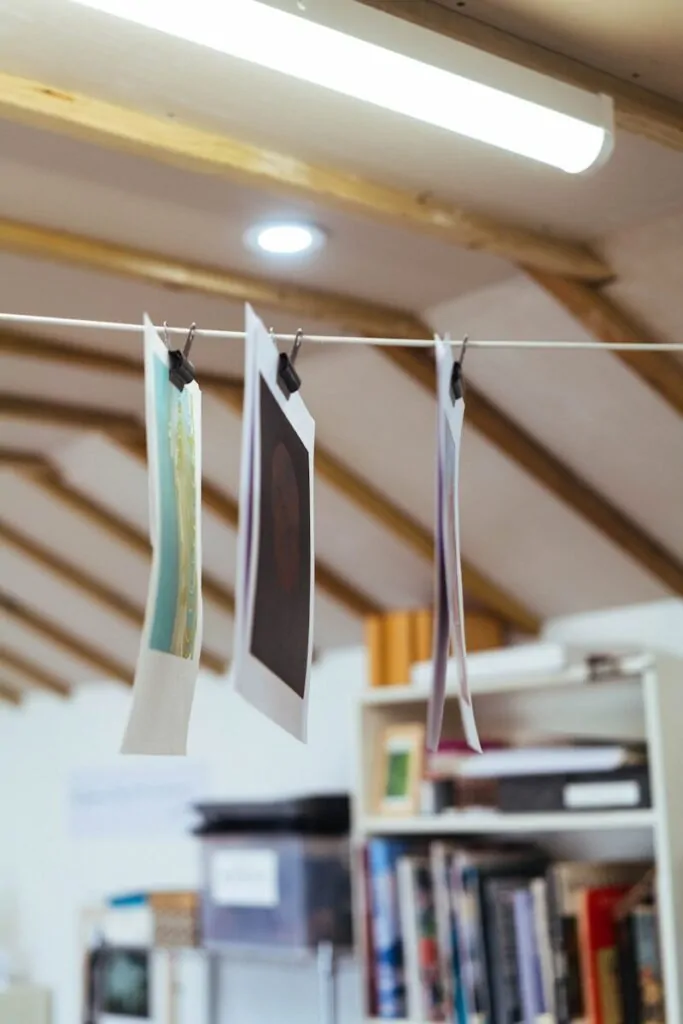 60 Meaningful Things to Do With Your Parents for Every Season and Situation 12 Photographs hang to dry on a string.