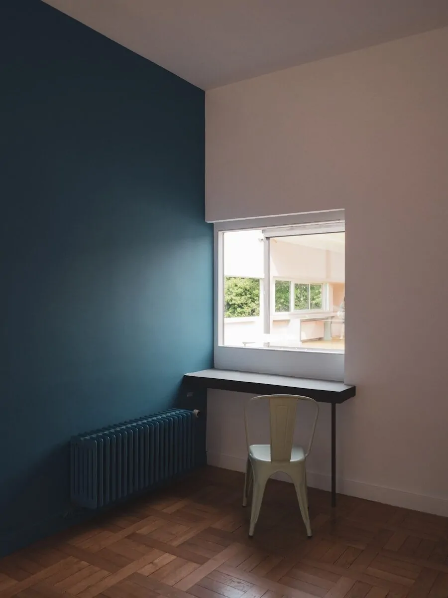 35+ Small Office Ideas for Working From Home 40 An empty room with a table and a radiator