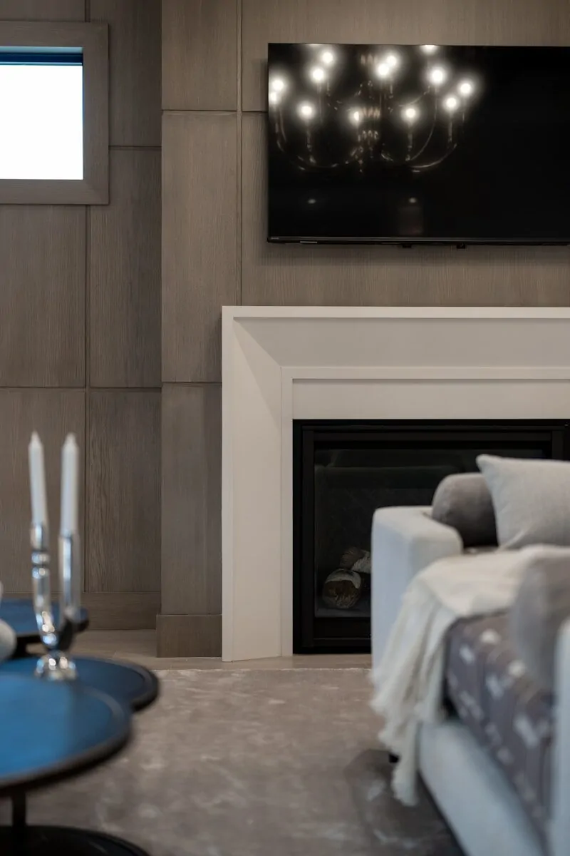 50 Luxury Living Room Ideas for Every Home Style 43 Modern living room with fireplace, tv, sofa, and candles.