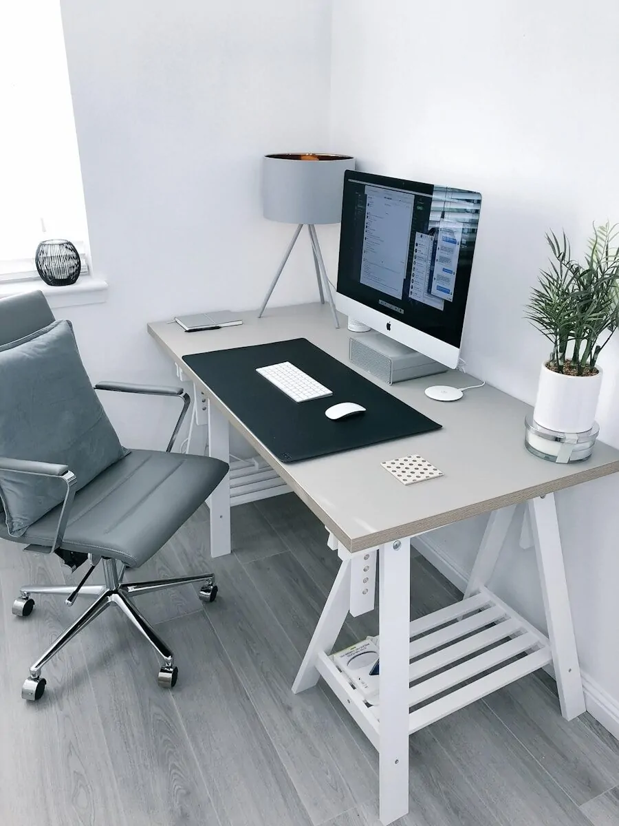 35+ Small Office Ideas for Working From Home 2 gray leather office rolling armchair beside white wooden computer desk