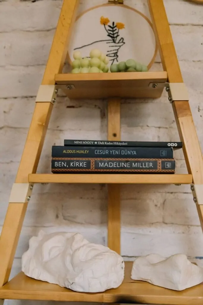 Stylish wooden bookshelf with books and decor, perfect for interior design inspiration.