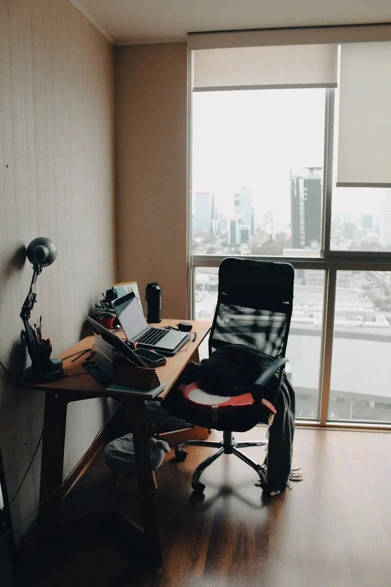 35+ Small Office Ideas for Working From Home 26 black office rolling chair beside brown wooden desk