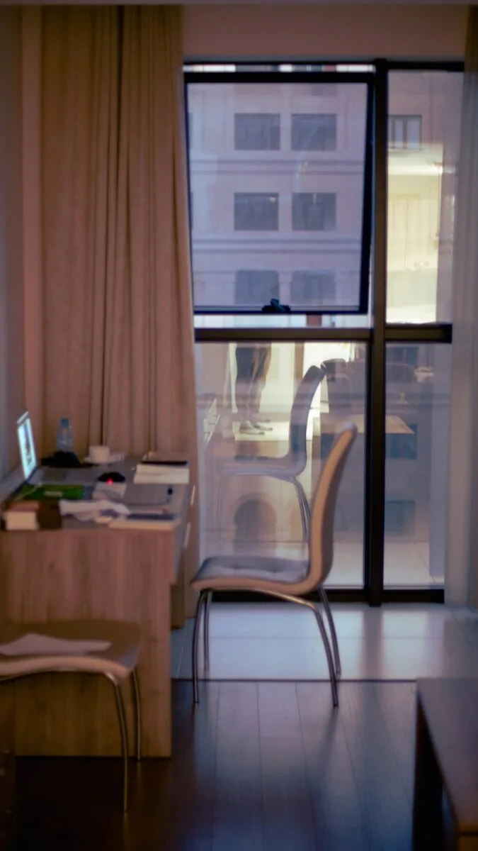 35+ Small Office Ideas for Working From Home 23 a chair sitting in front of a window next to a desk