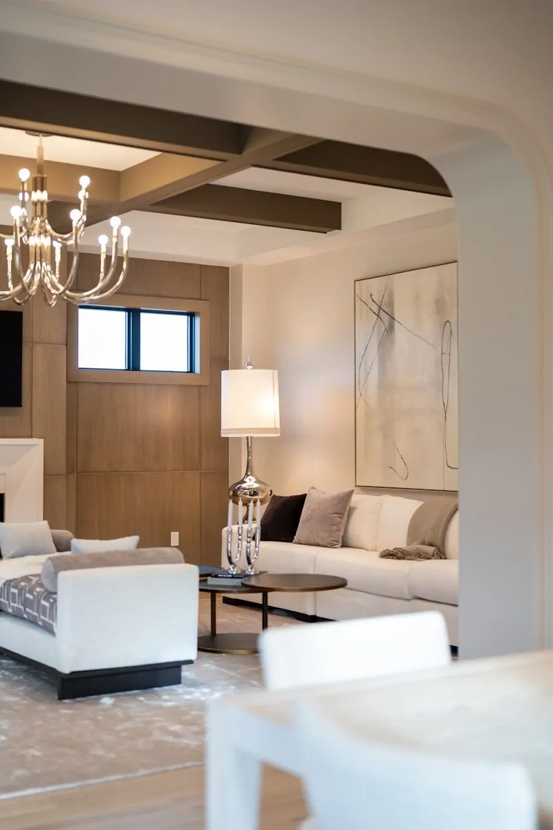 50 Luxury Living Room Ideas for Every Home Style 26 Modern living room with white sofa and abstract art.