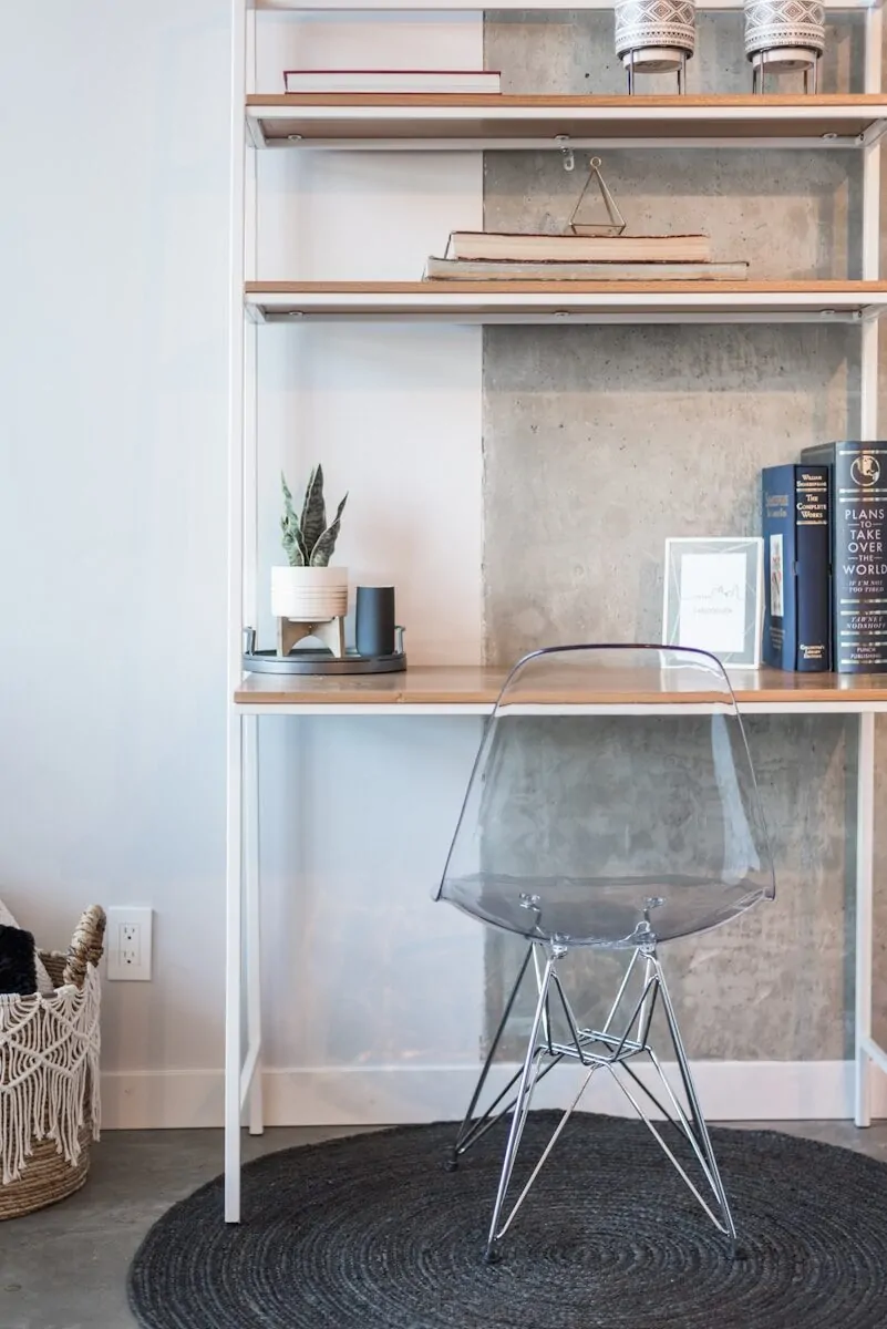 35+ Small Office Ideas for Working From Home 30 a room with a book shelf and a chair