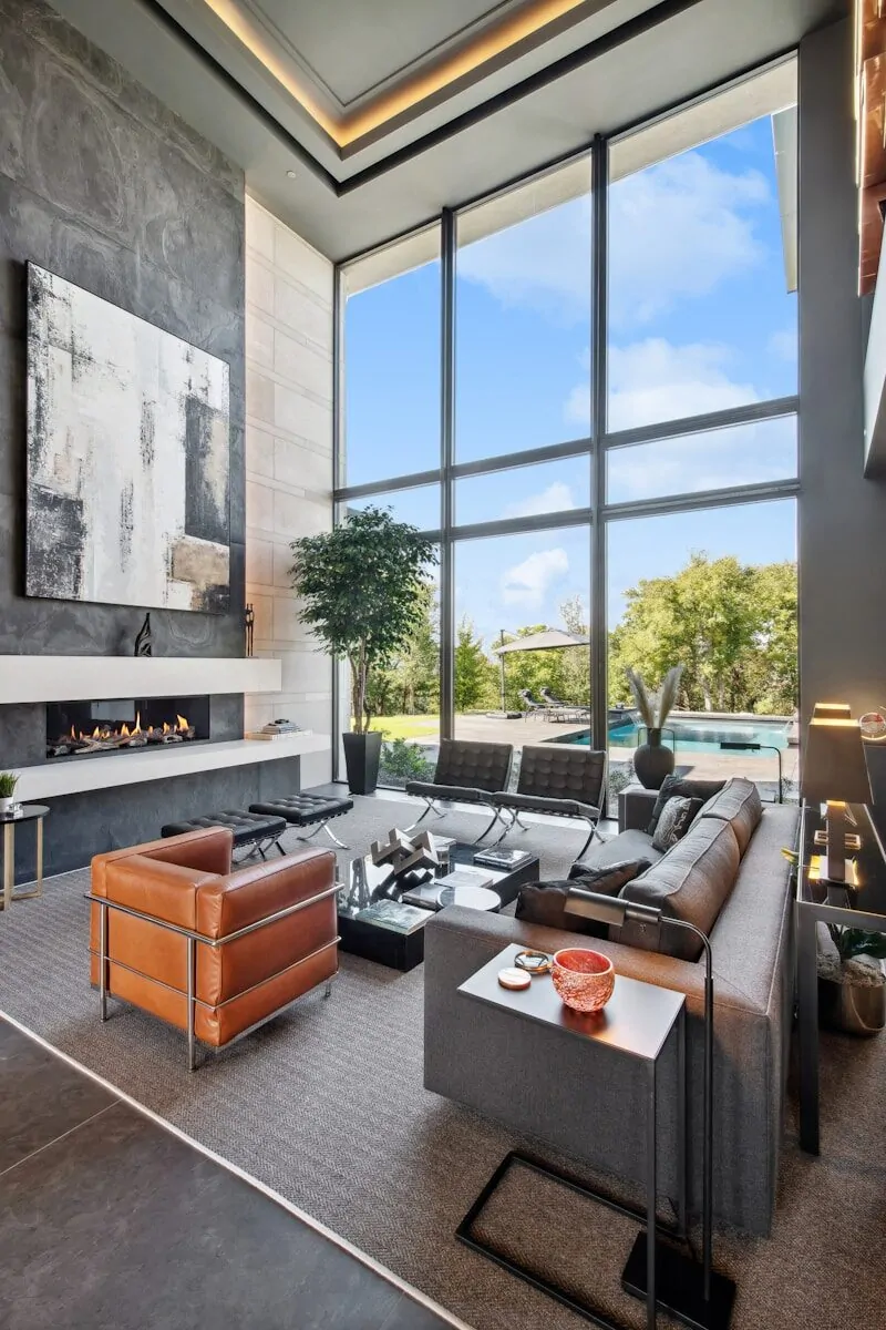 50 Luxury Living Room Ideas for Every Home Style 22 Modern living room with large windows and fireplace