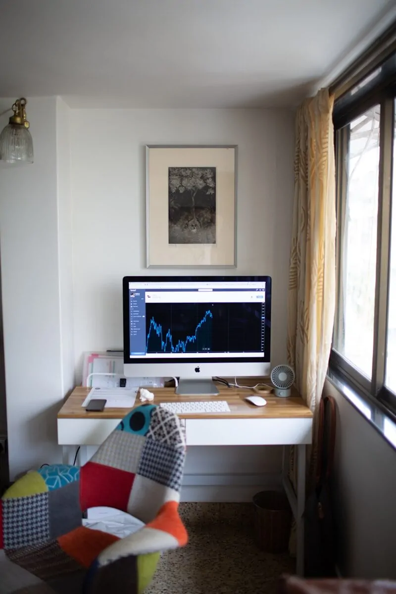 35+ Small Office Ideas for Working From Home 19 silver imac on brown wooden desk