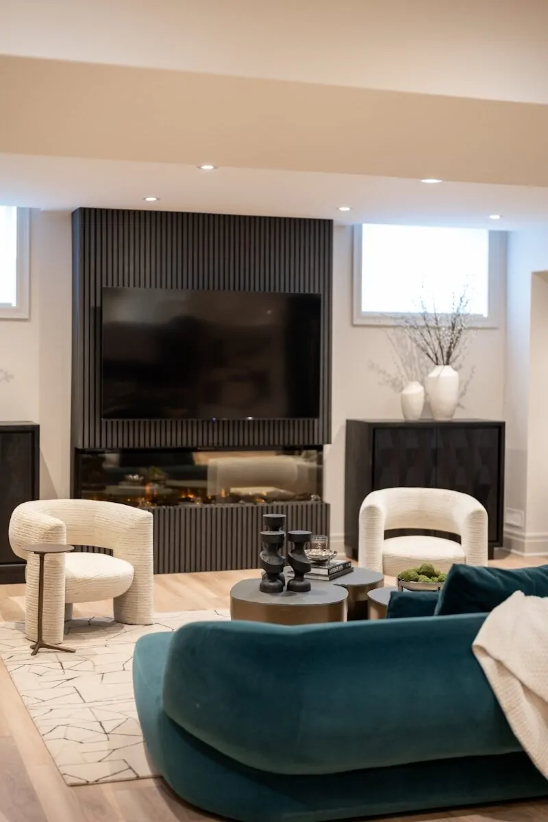 50 Luxury Living Room Ideas for Every Home Style 38 Modern living room with teal sofa and fireplace