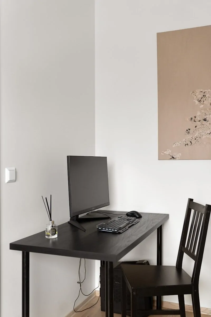 35+ Small Office Ideas for Working From Home 28 A desk with a laptop on top of it
