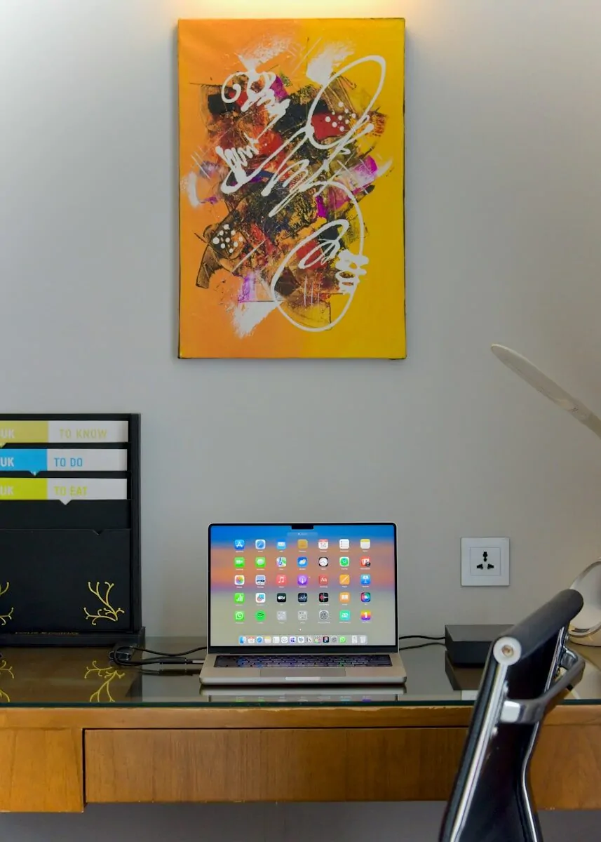 35+ Small Office Ideas for Working From Home 32 a laptop computer sitting on top of a wooden desk