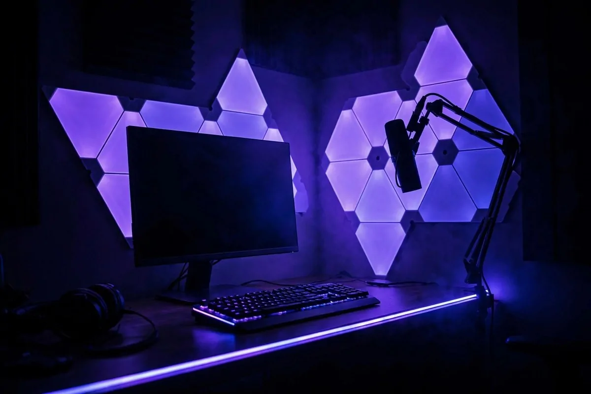 19 Content Creator Studio Setups for Every Budget 13 Floating wall-mounted desk studio with shelves holding camera gear