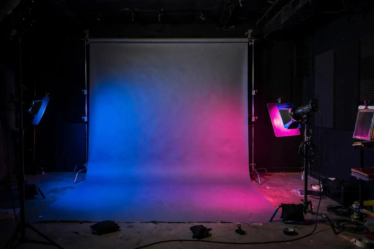 Colorful gel lighting in blue and magenta for Senior Photo Studio Ideas portraits