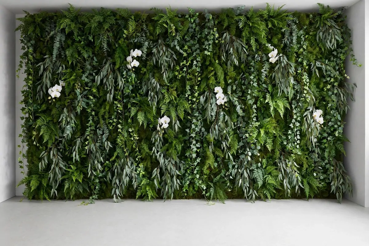 Lush greenery wall for Wedding Photo Studio Ideas: dense wall of ferns, eucalyptus and leaves