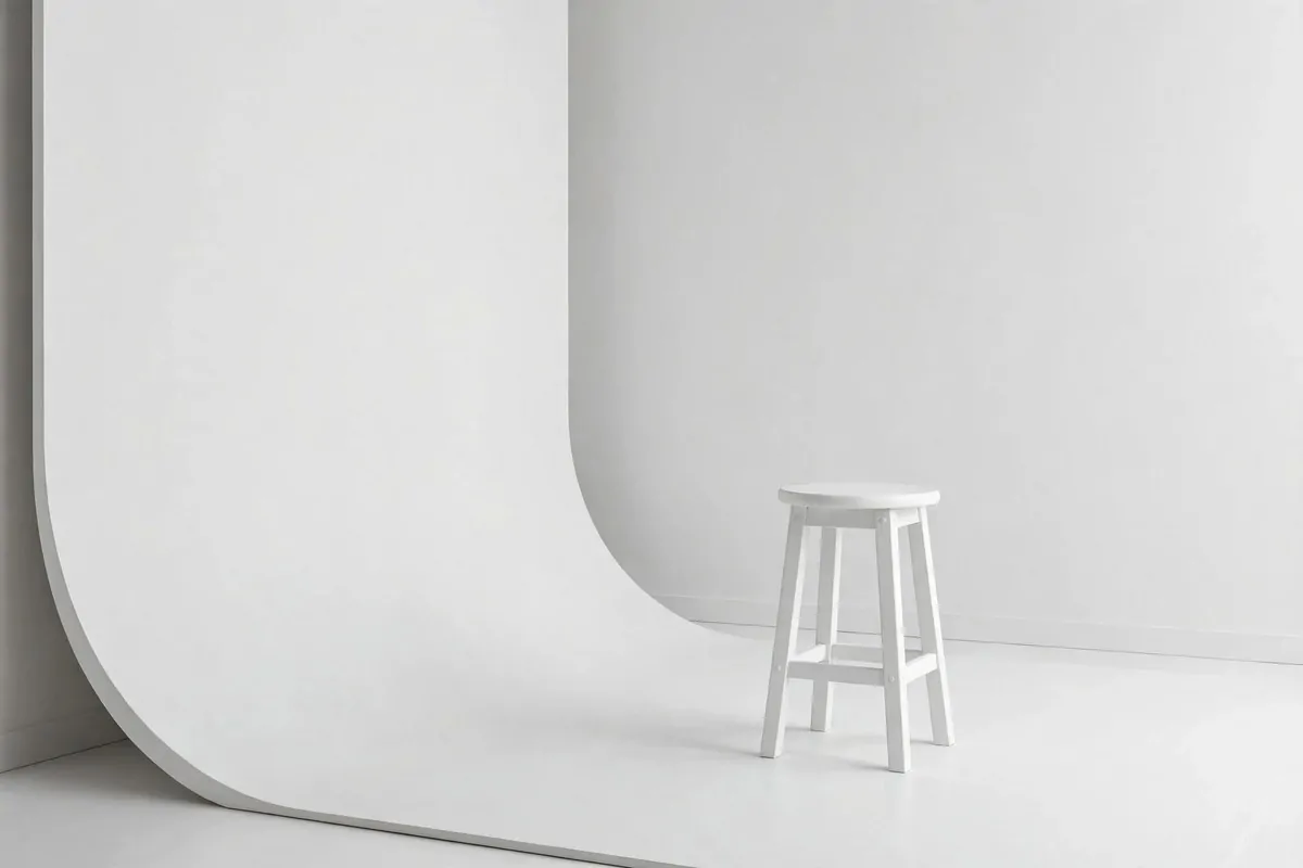 25 Photo Studio Ideas That Look Pro on a Tiny Budget 25 All white minimal photo studio set with white walls, white floor and soft even lighting