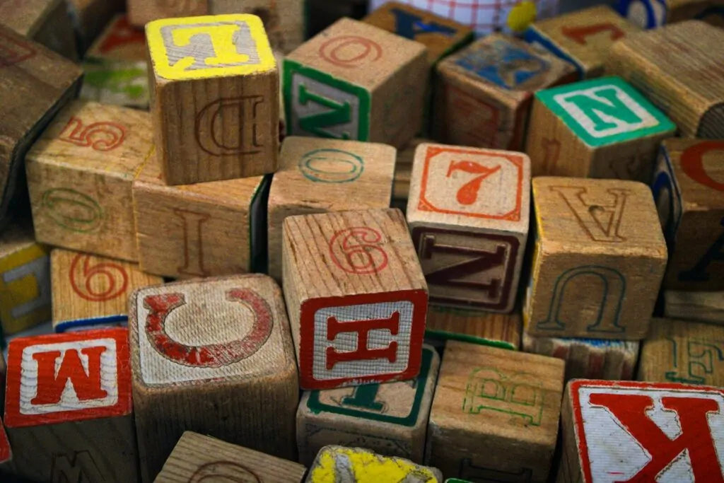 5-Letter English Words Quiz: How Many Can You Name and How Strong Is Your Vocabulary Really? 1 a pile of wooden blocks with letters on them