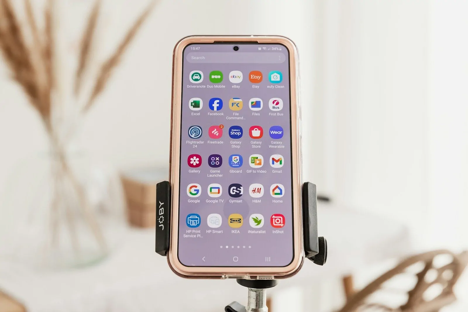 How to Organize My Phone for Productivity 1 a cell phone sitting on top of a tripod