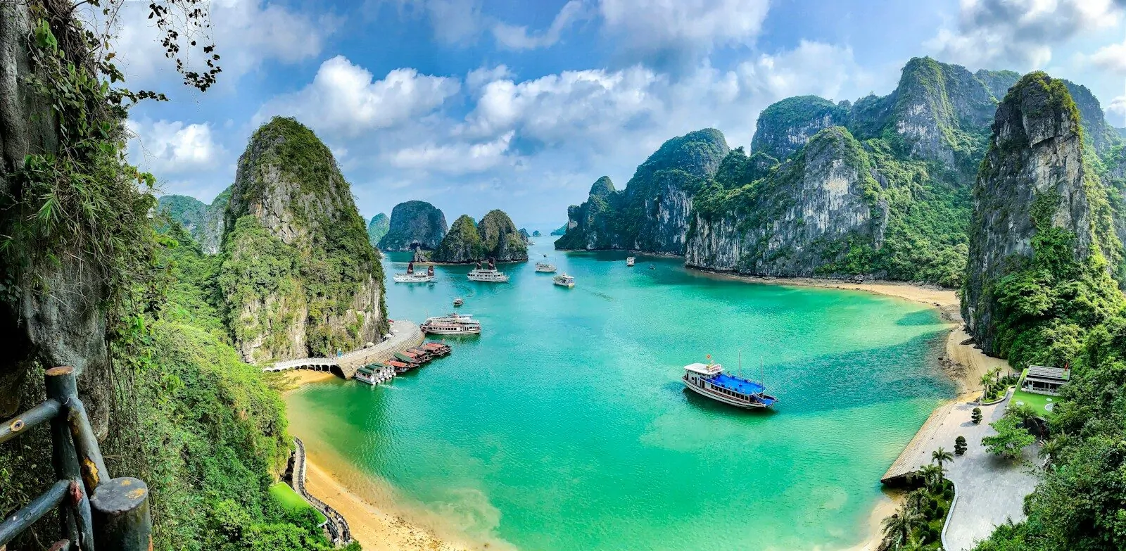 Only 4 Countries Start With V, Can You Name All 4? Most People Miss One! 1 Boats on the turquoise water of Ha Long Bay surrounded by limestone karst islands