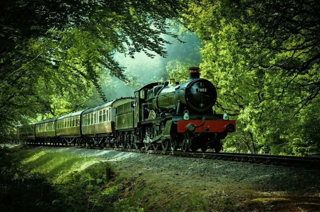 Which Era Do I Belong In? Take This Fun Quiz To Discover Your True Time Period 1 black and red train passing through forest