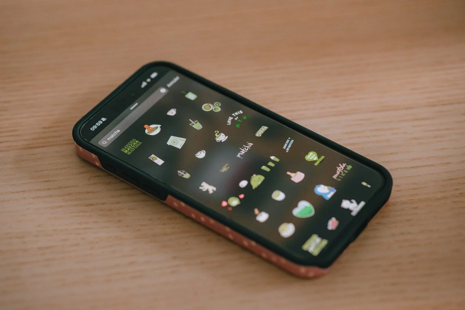 A smartphone with many app icons displayed