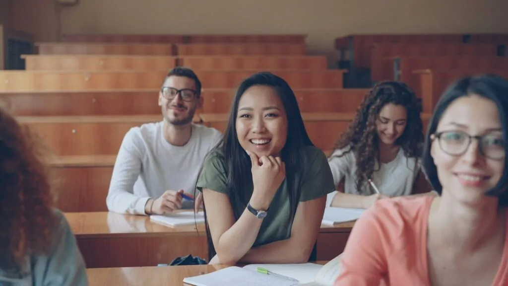 Which Degree Is Right for Me Quiz: Find Your Perfect Study Path in 10 Questions 1 Students smiling in a lecture hall classroom