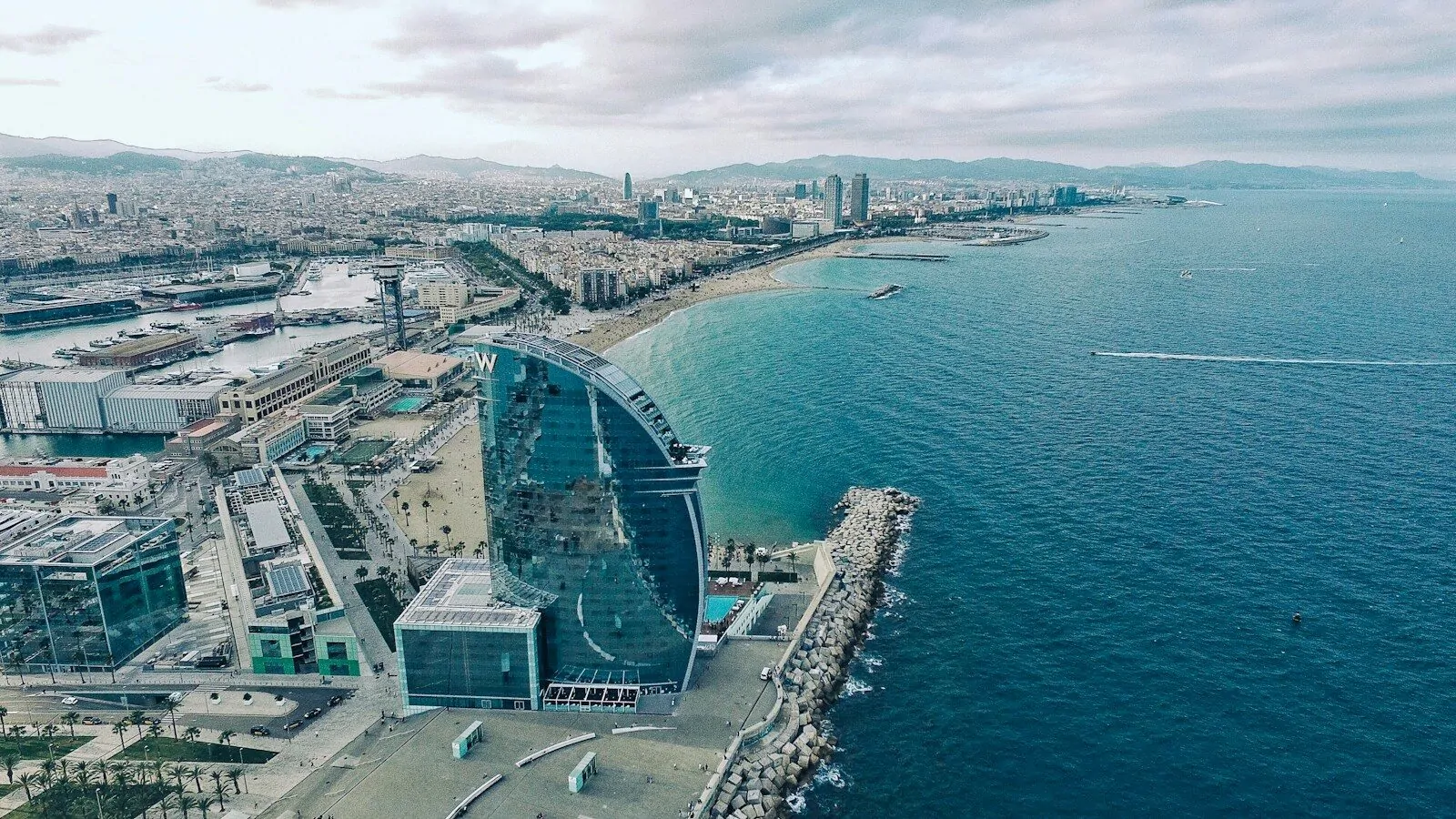 11 Countries Start With T, Can You Name Them All? I Got 9, Beat Me If You Can! 1 aerial view of Barcelona coastline